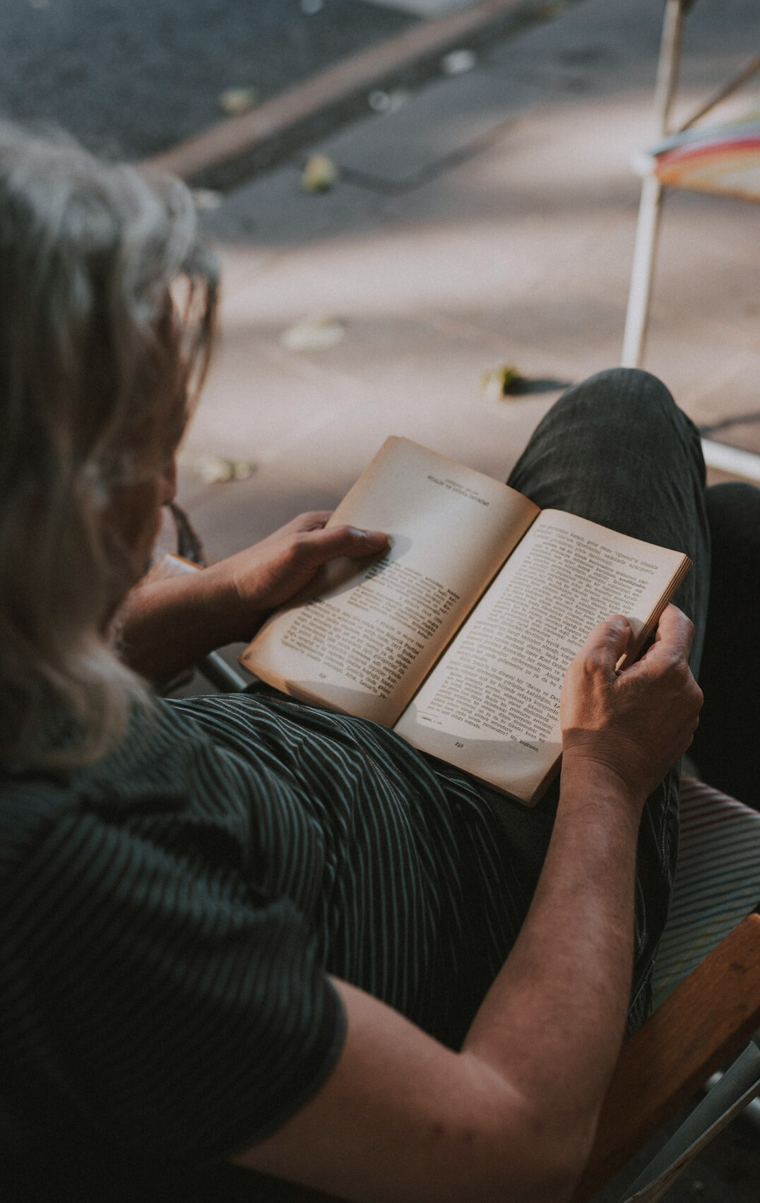 person reading thriller book