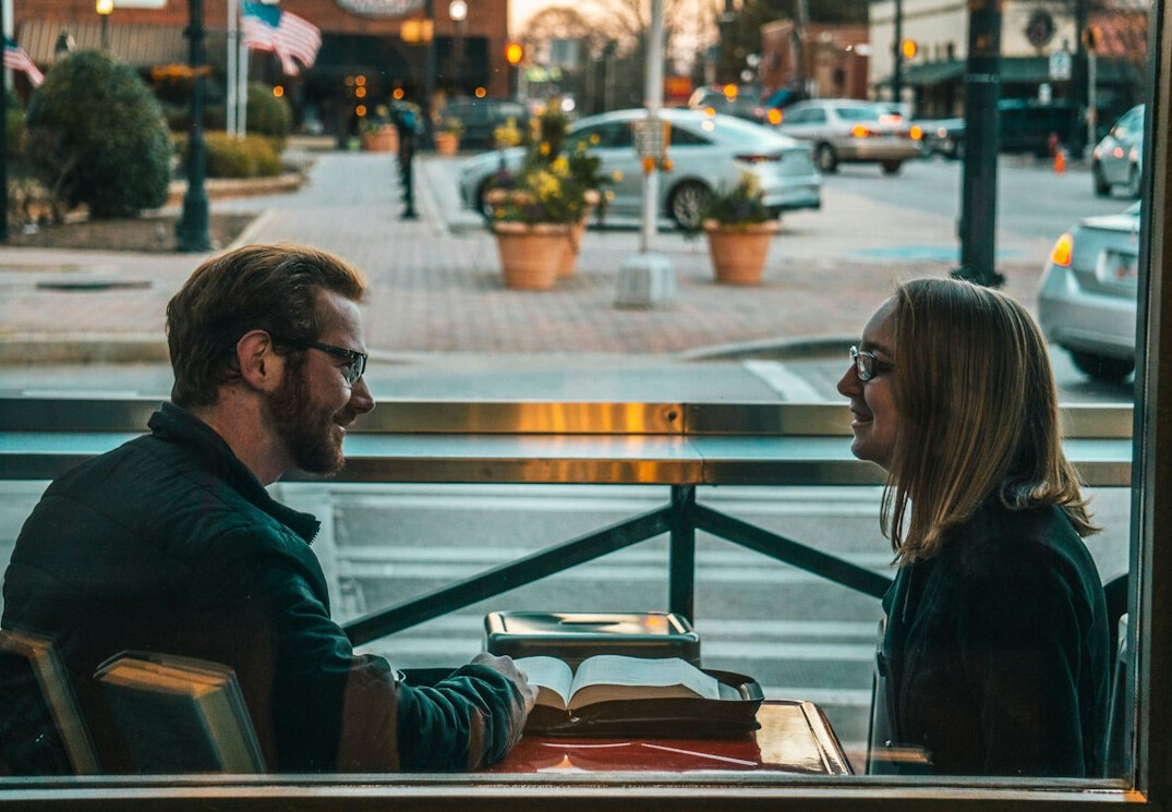 two people in tense conversation